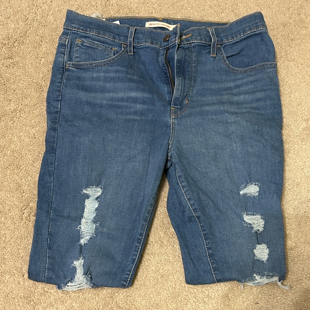 Levi’s Distressed Blue Denim Jeans